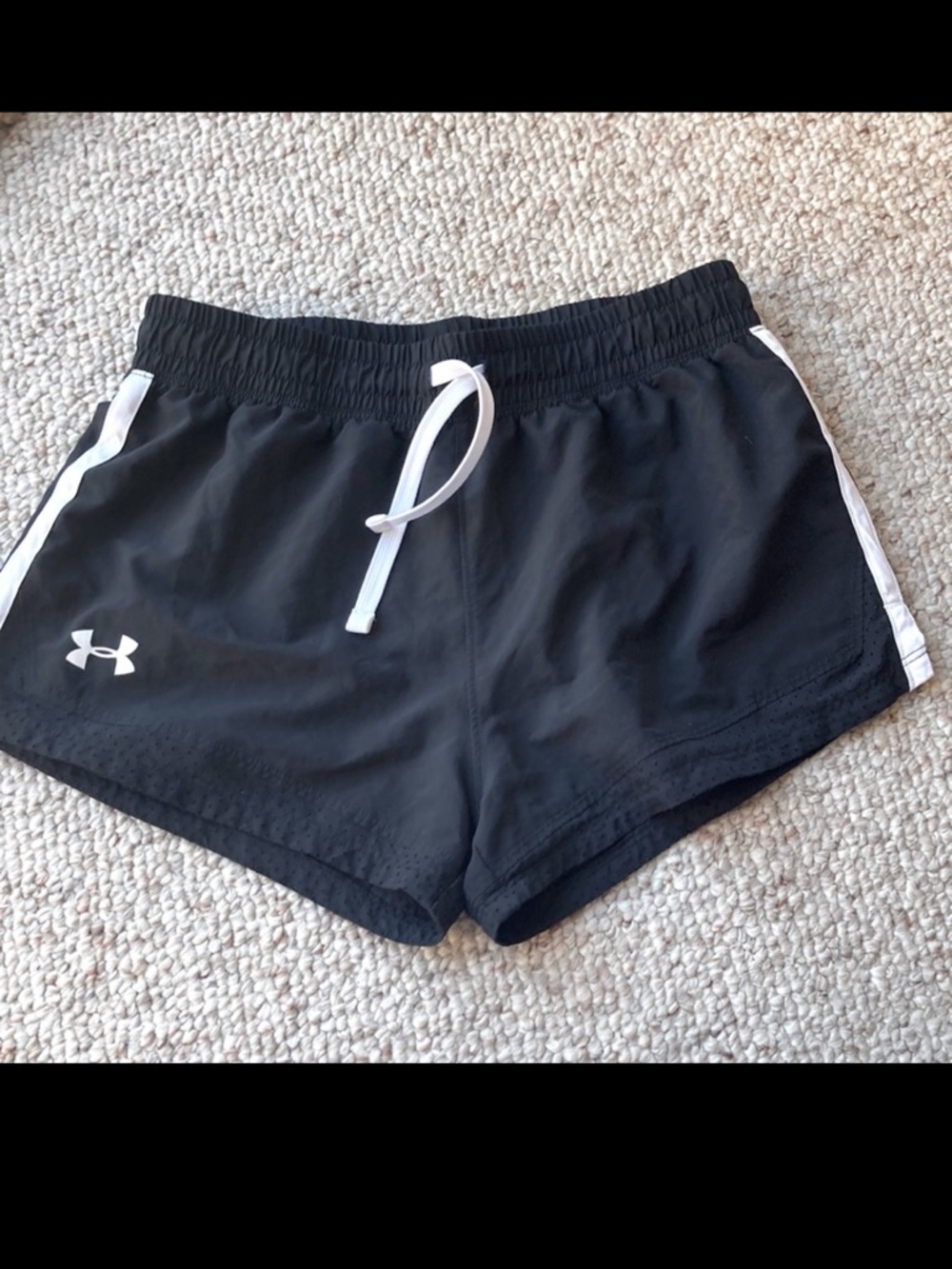 Under Armour running shorts Black w/white stripe Mesh hem for cooling. Sz S. EUC